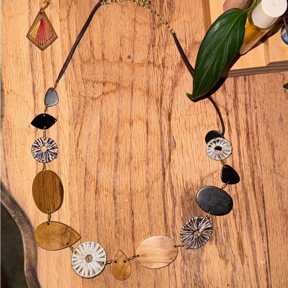Gold and Black Eclectic Necklace with Unique Elements